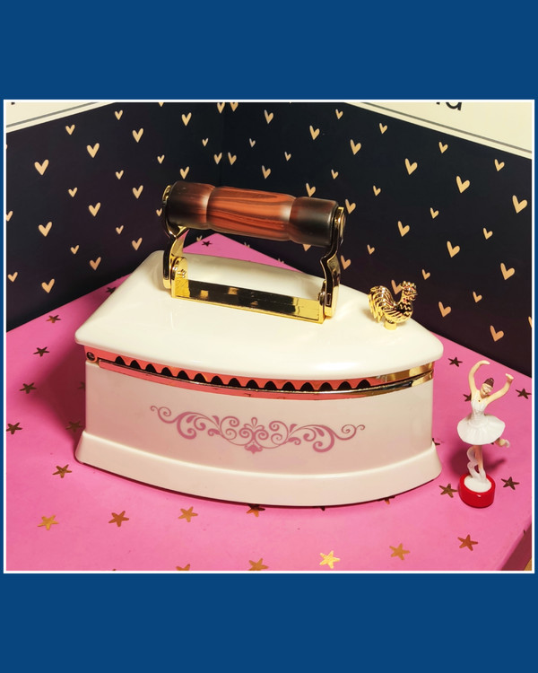 اتو موزیکال کوکی رنگ سفید